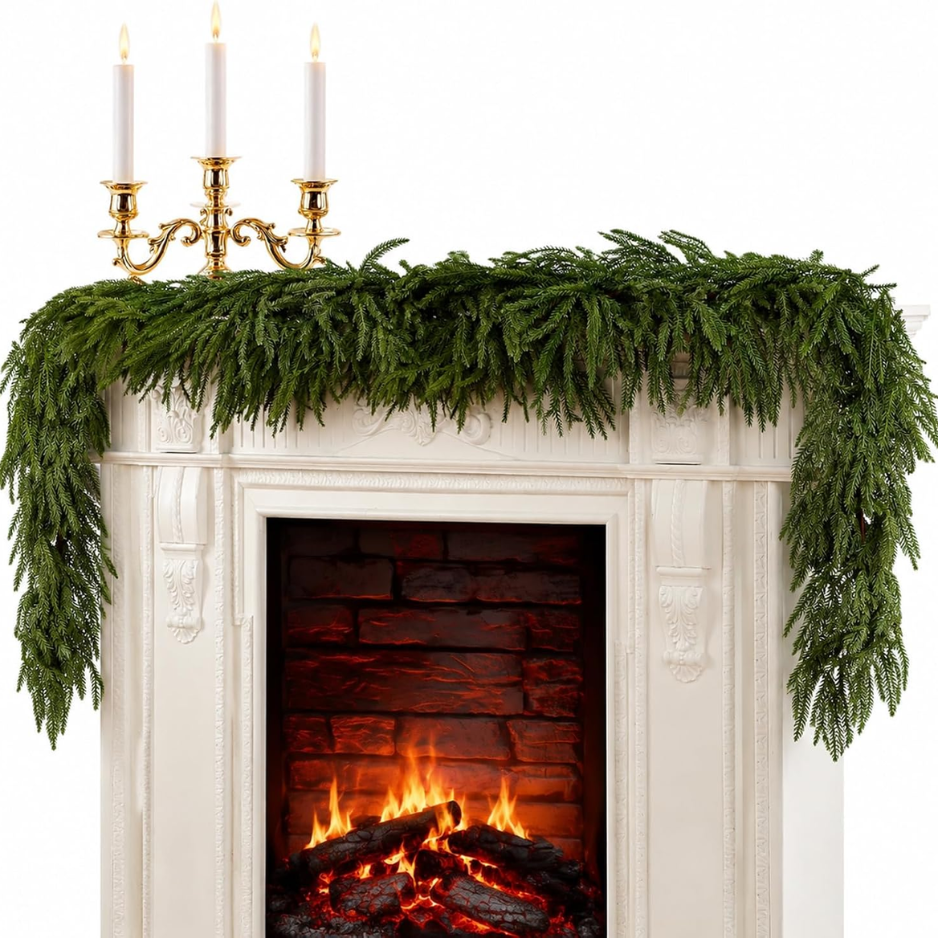 Green 6-foot Norfolk pine Christmas garland arranged on a white surface