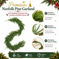 Green 6-foot Norfolk pine Christmas garland arranged on a white surface